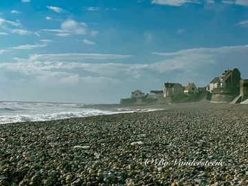 Tranquil Shores, Pebble Beach on the Opal Coast
